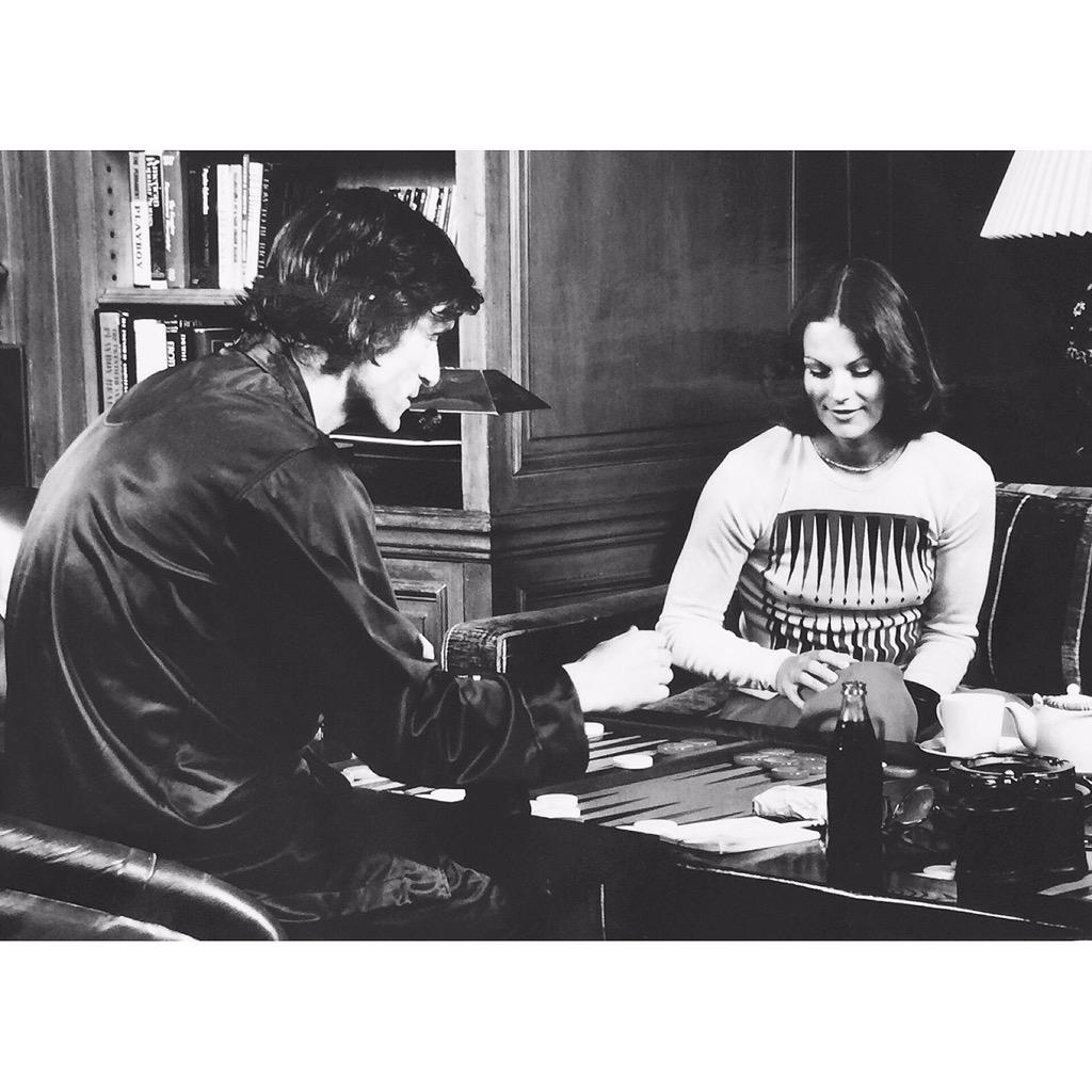 Hugh Hefner playing backgammon with this daughter Christie in 1974